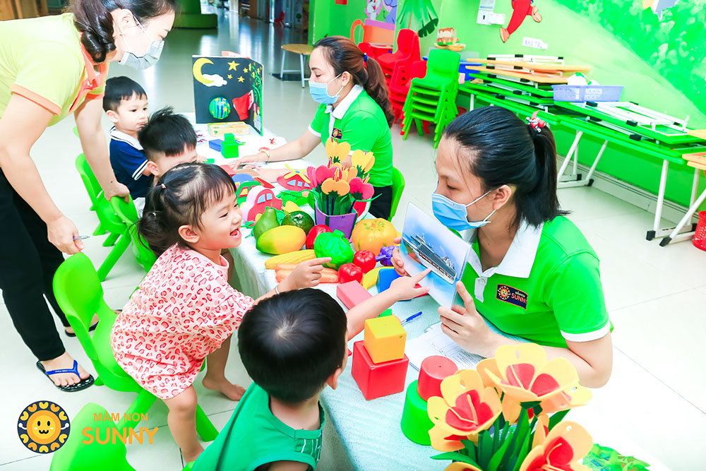 dong phuc giao vien mam non sunny