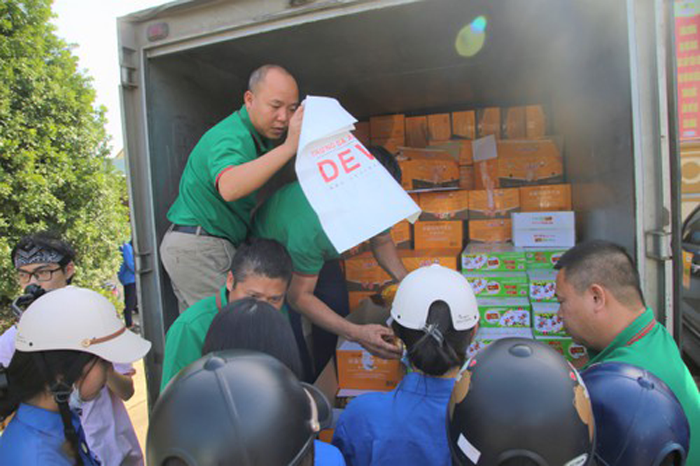 hinh anh dong phuc tap doan dabaco viet nam