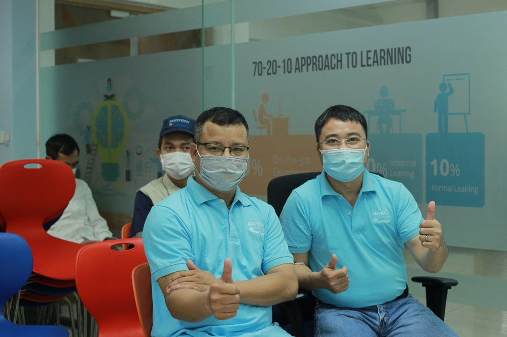 hinh anh dong phuc cong ty suntory pepsico viet nam