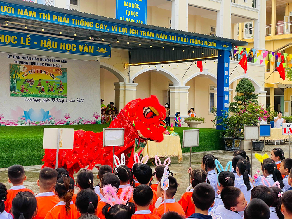 dong phuc hoc sinh truong tieu hoc vinh ngoc