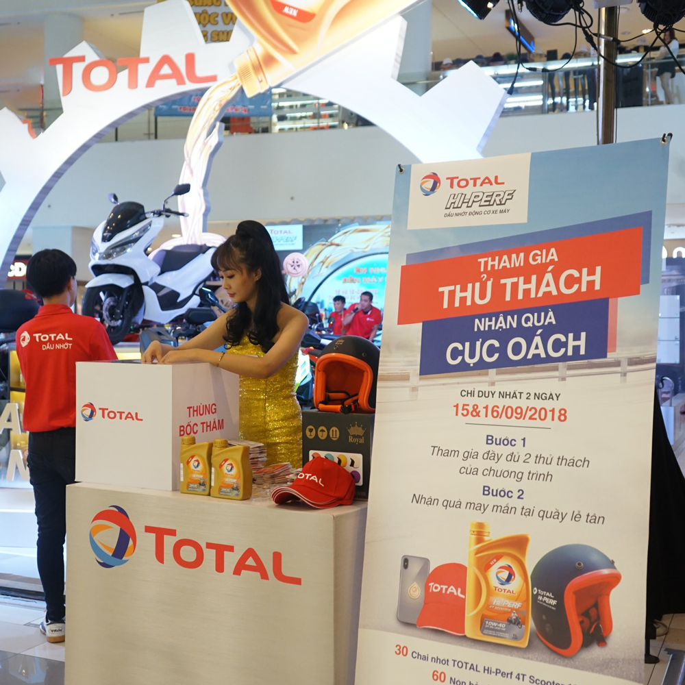 hinh anh dong phuc quang cao nhan vien total dau nhot