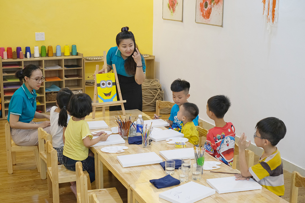 dong phuc hoc sinh ntc academy mam non nha tre con