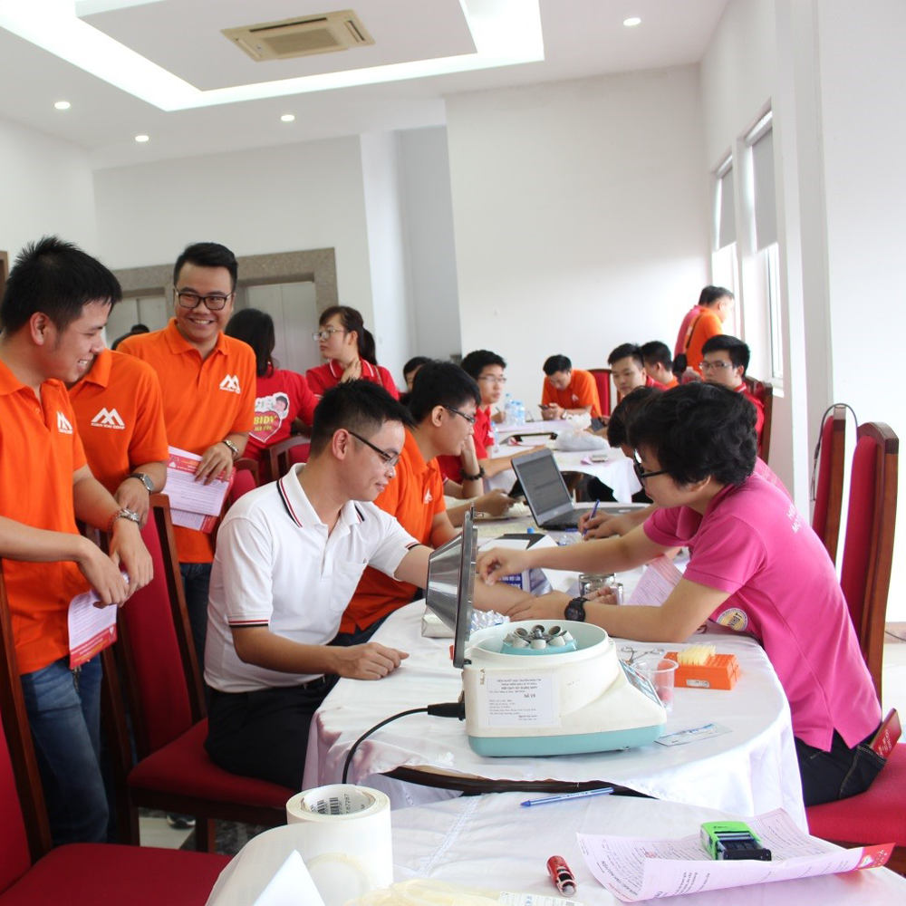 hinh anh dong phuc xuan mai corp